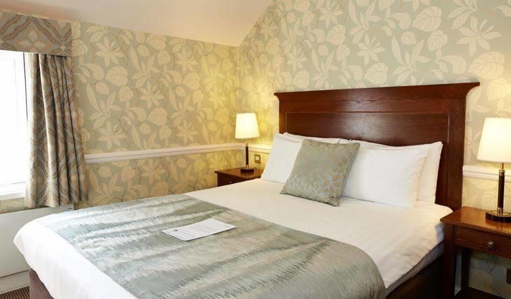 טאוצ'סטר Saracens Head Hotel By Greene King Inns מראה חיצוני תמונה